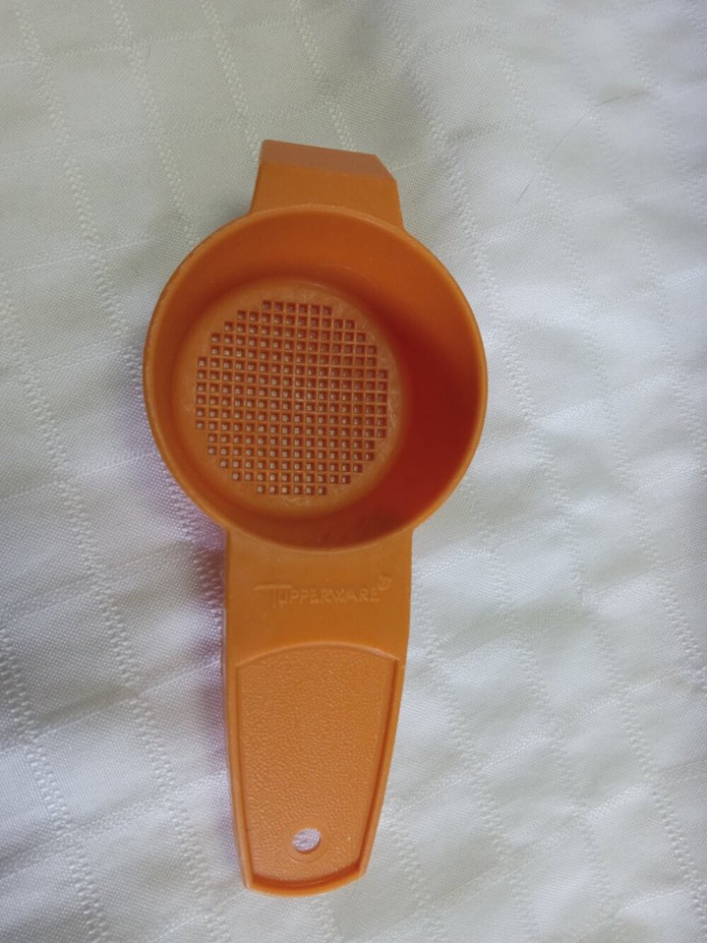 Two vintage Tupperware kitchen tools